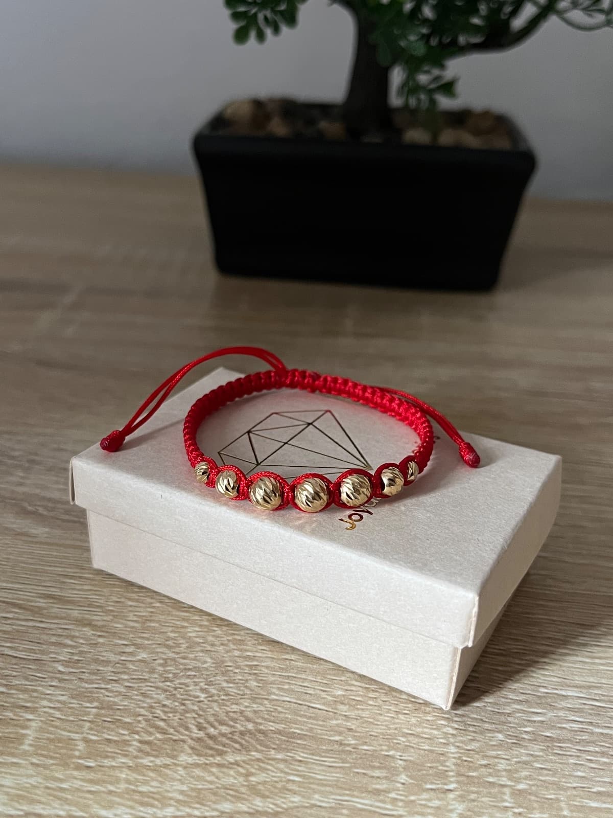Pulsera entre tejida balín diamantado